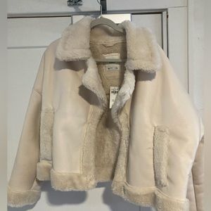 White leather and fur coat